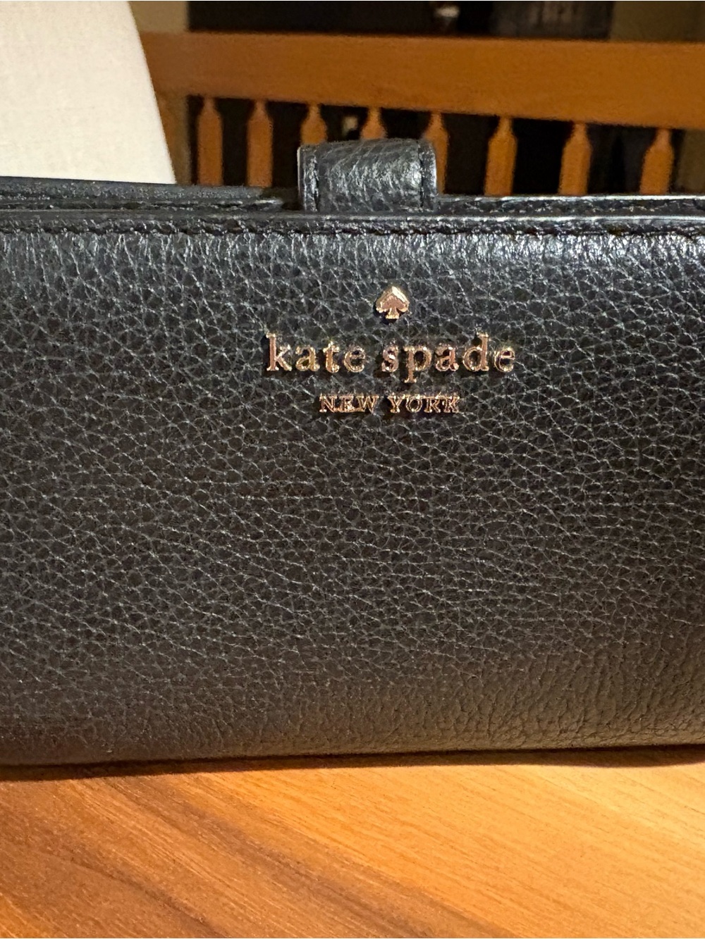 kate spade Black Pebbled Leather Wallet with Gold Logo